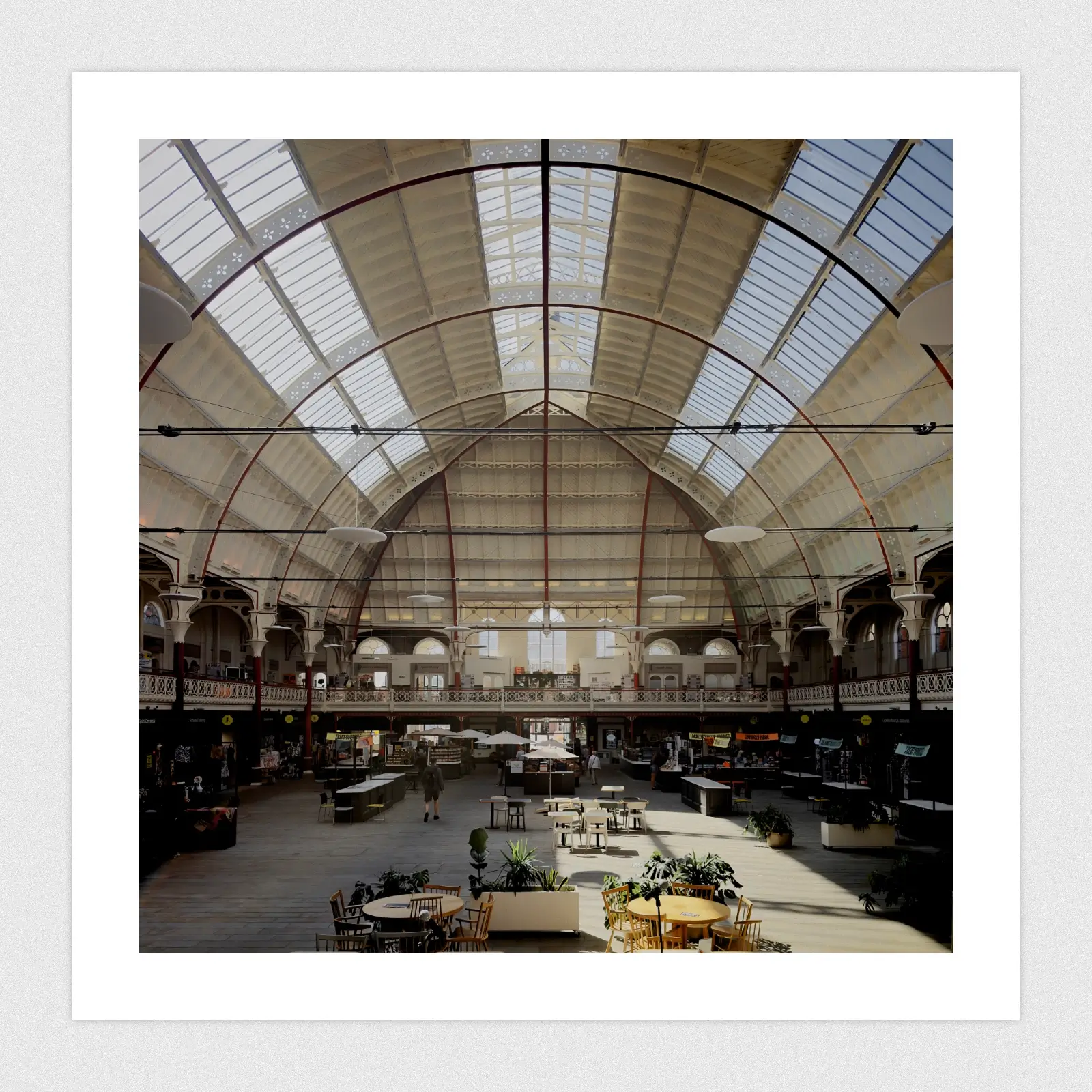 Portfolio The inside of a symmetrical market hall.