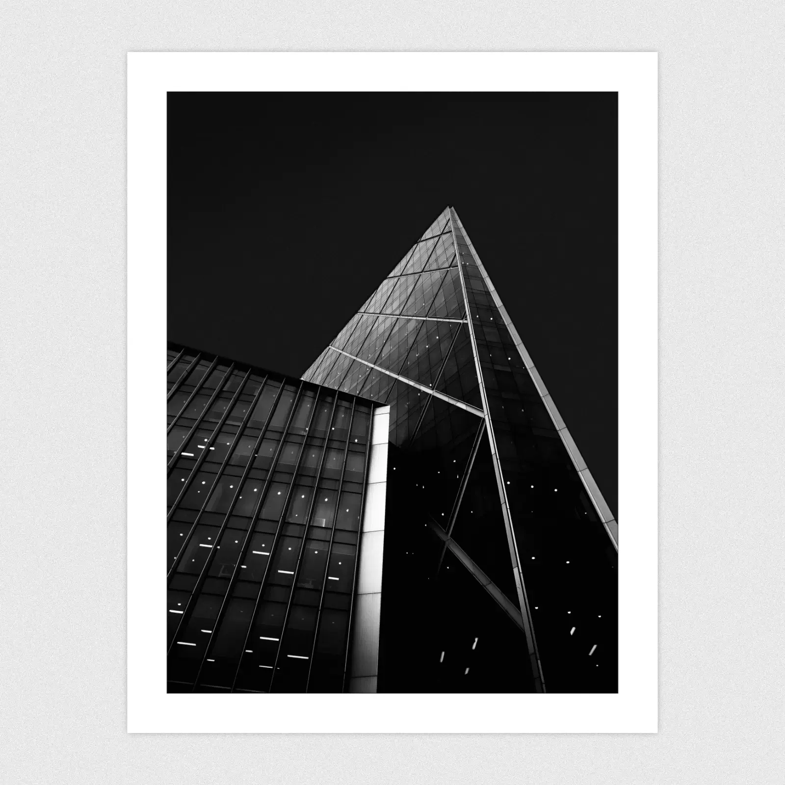 Portfolio A dark mode edit of two overlapping buildings against a black background.