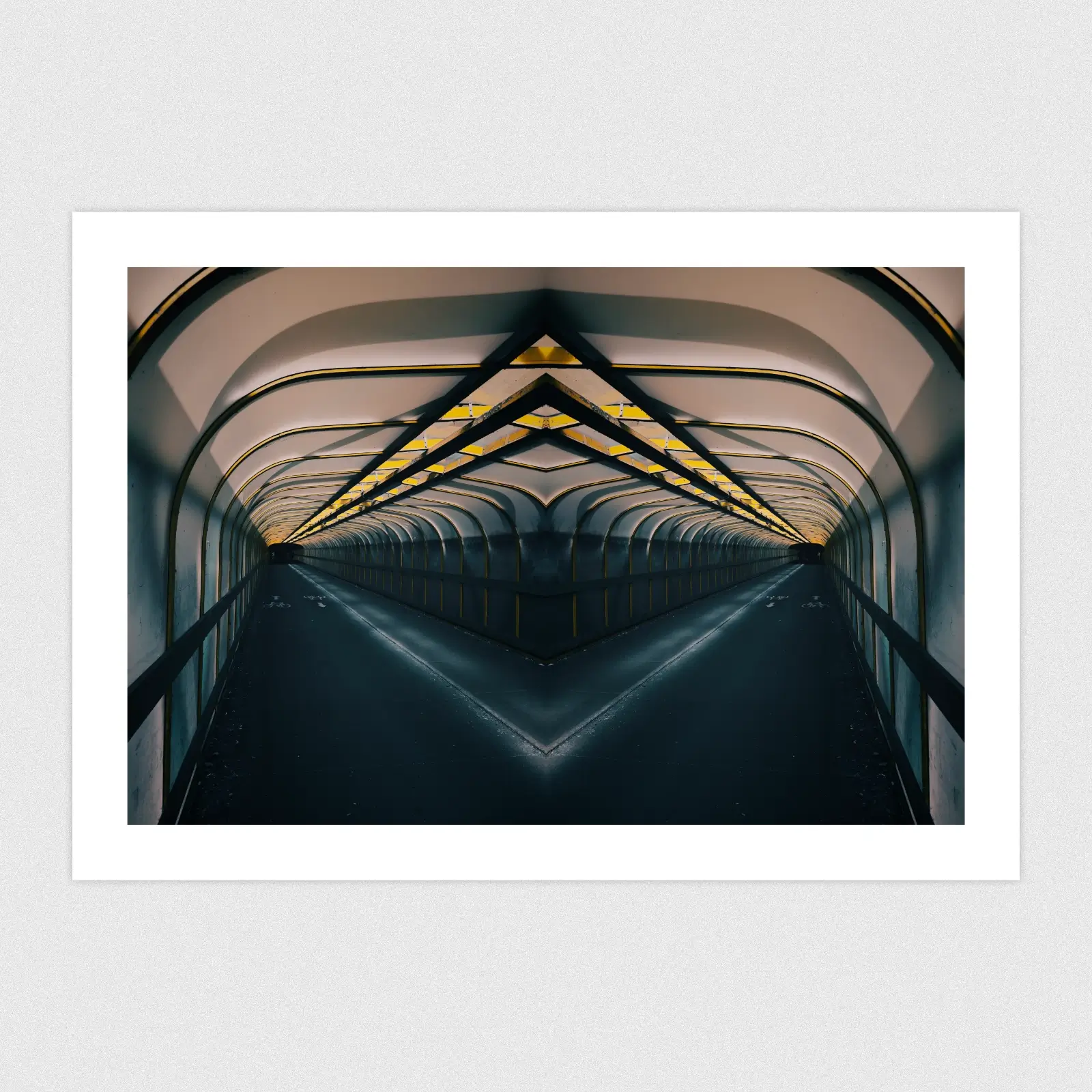 Portfolio A reflected shot of the inside of a railway bridge with cinematic colours and lighting.