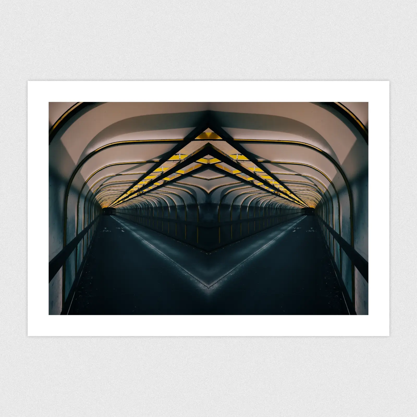 Portfolio A reflected shot of the inside of a railway bridge with cinematic colours and lighting.