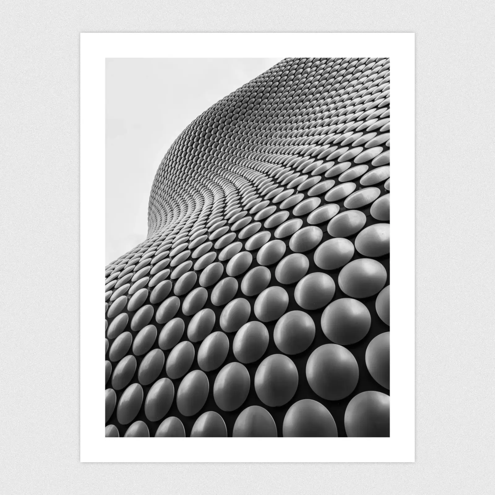 Portfolio An abstract architecture shot with lots of silver dots.
