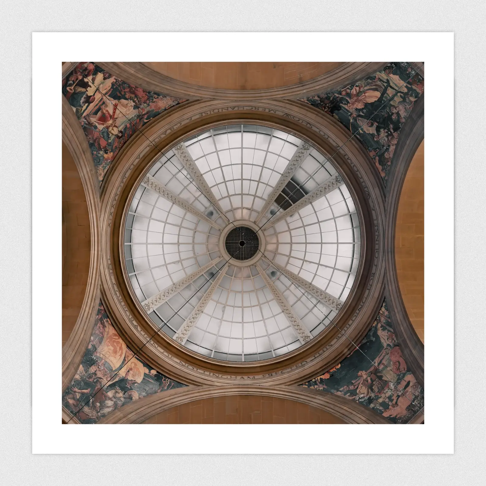 Portfolio A glass dome in an ornate ceiling.