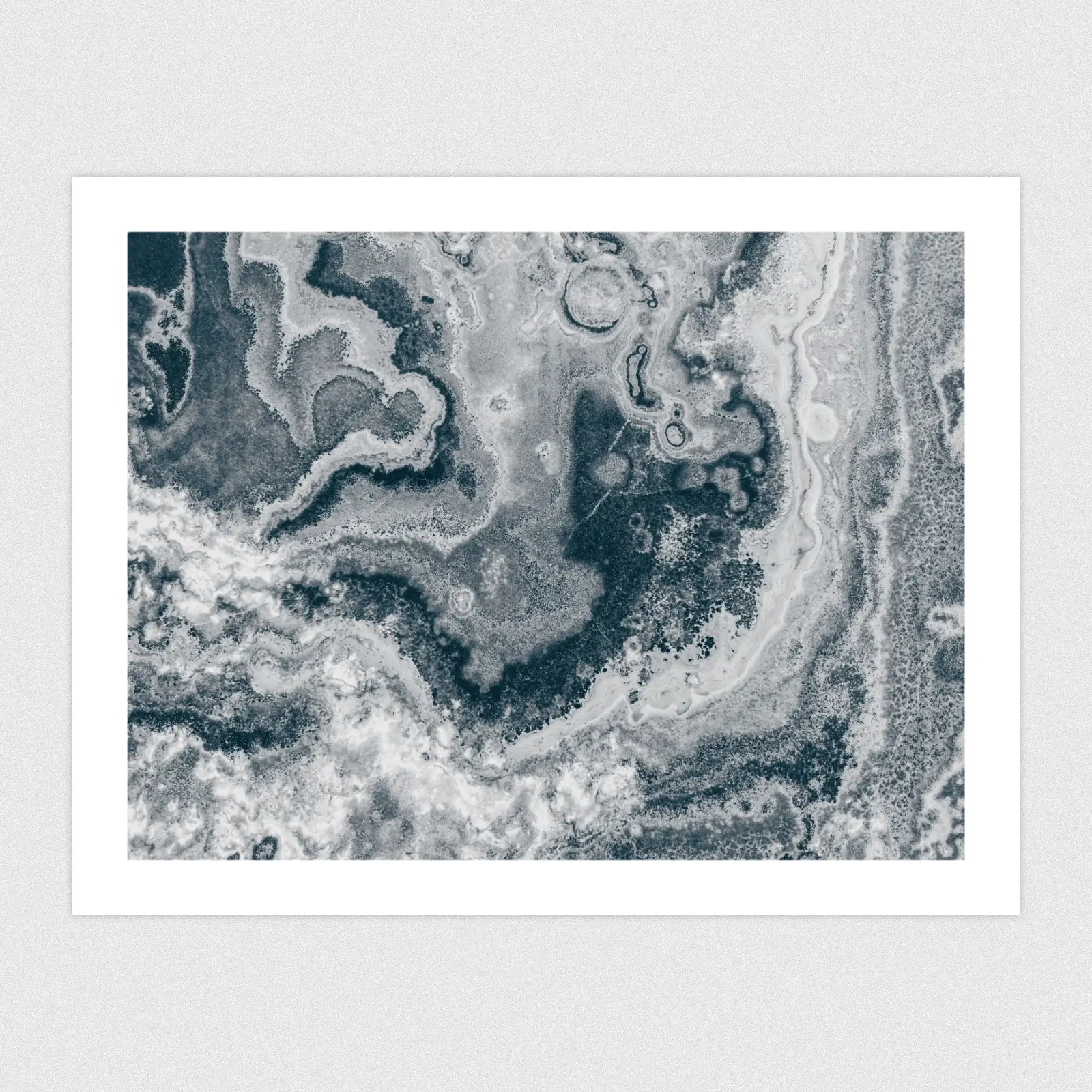 Abstract marble texture in blue monochrome.