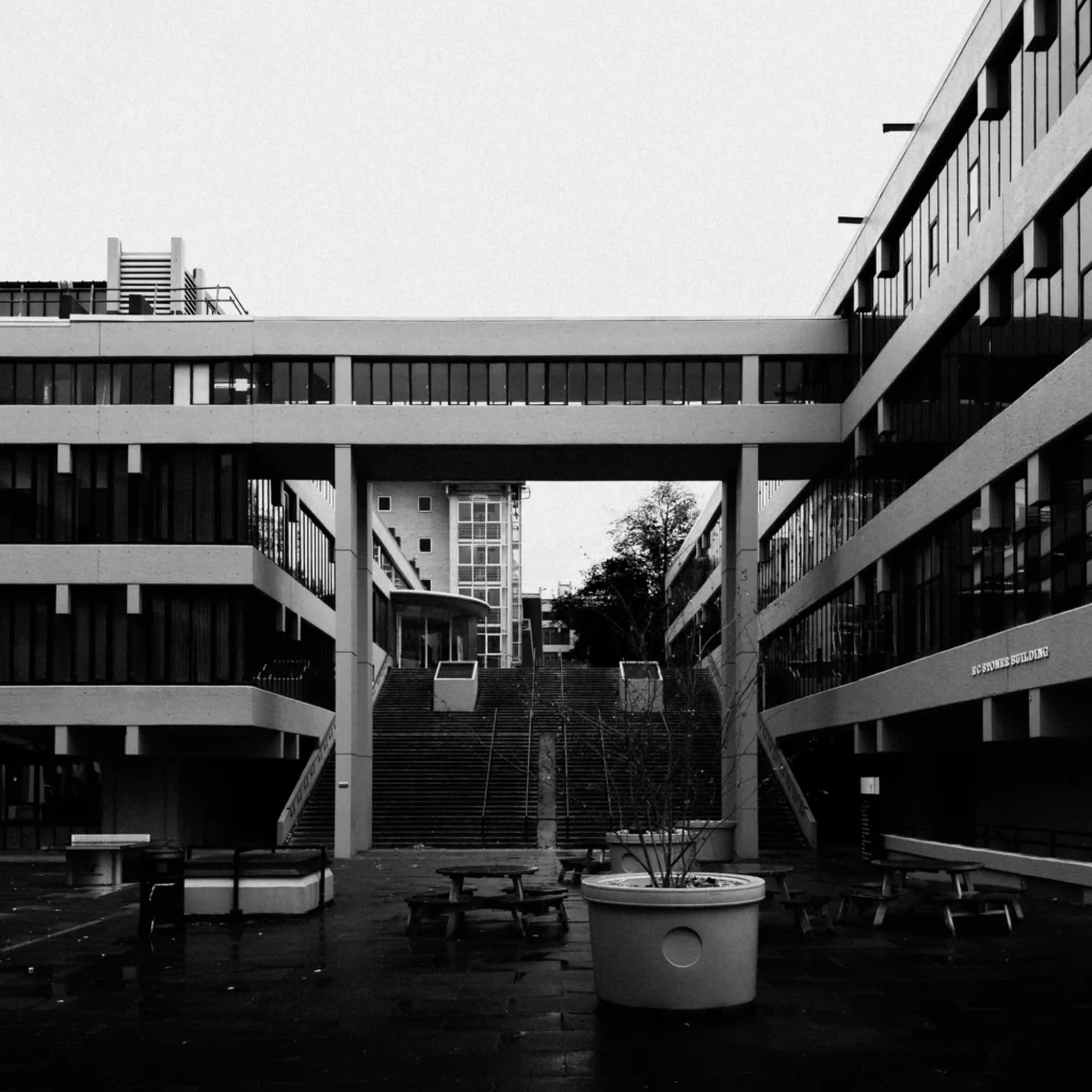 Black and white photo of Brutalist architecture on an overcast day.