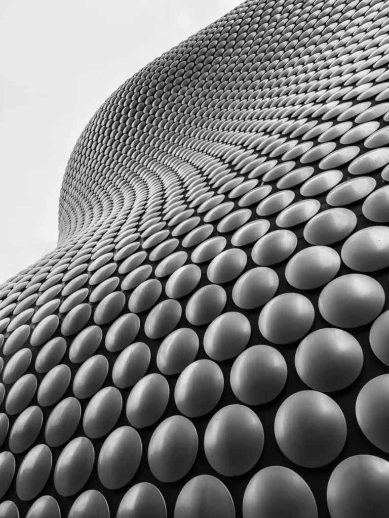 An abstract architecture shot with lots of silver dots.